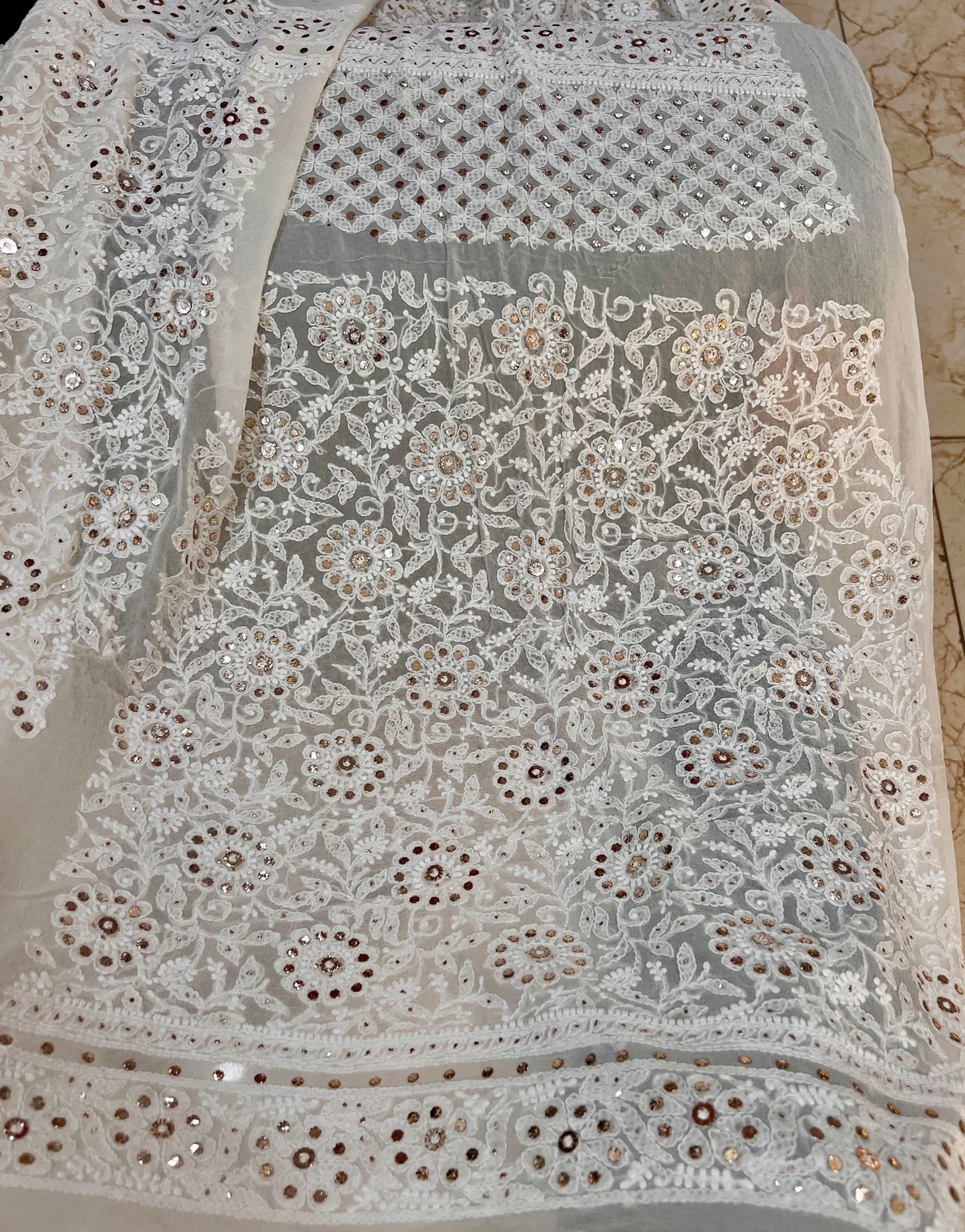 Off white Ruhani Chikankari and Mukaish Lehenga