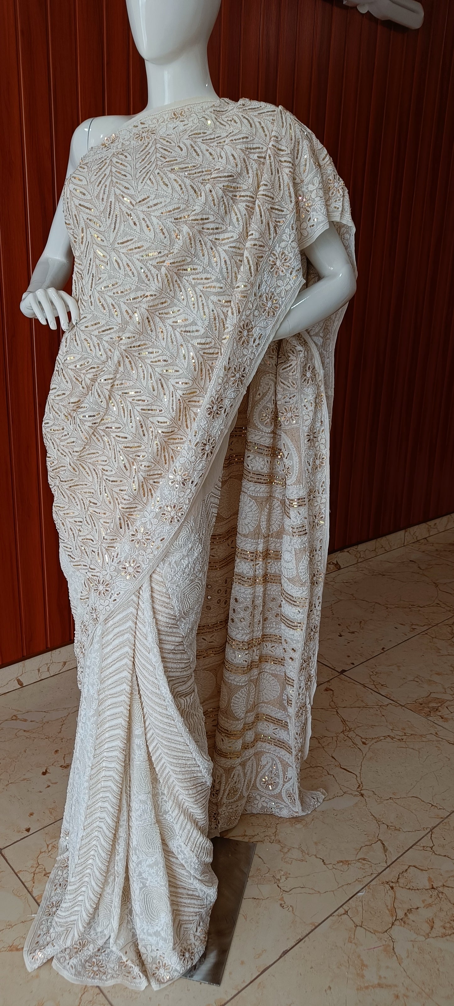 Ruhani Ivory Chikankari Saree with heavy Sequins Pearl and Aari Embroidery