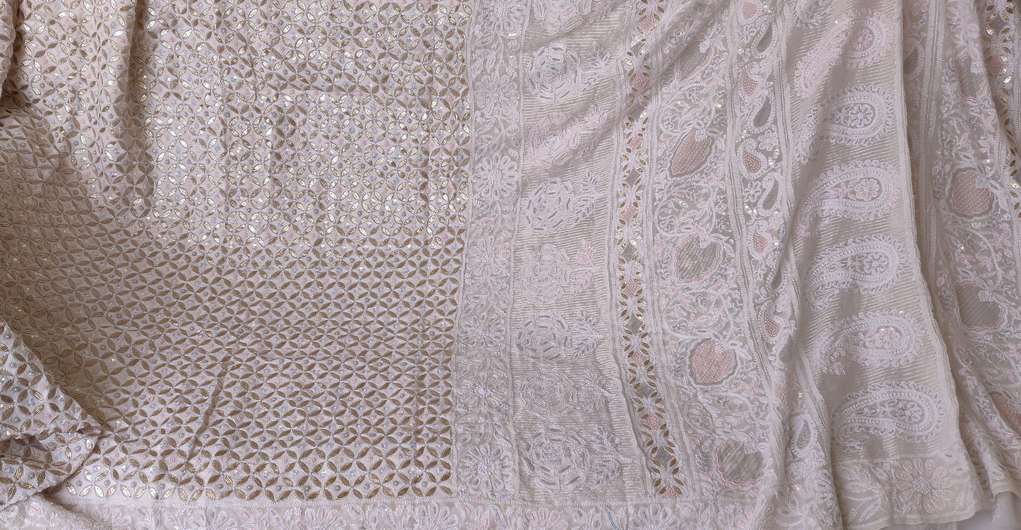 Ruhani Ivory Masterpiece Chikankari Gota and heavy pearl embroidered saree